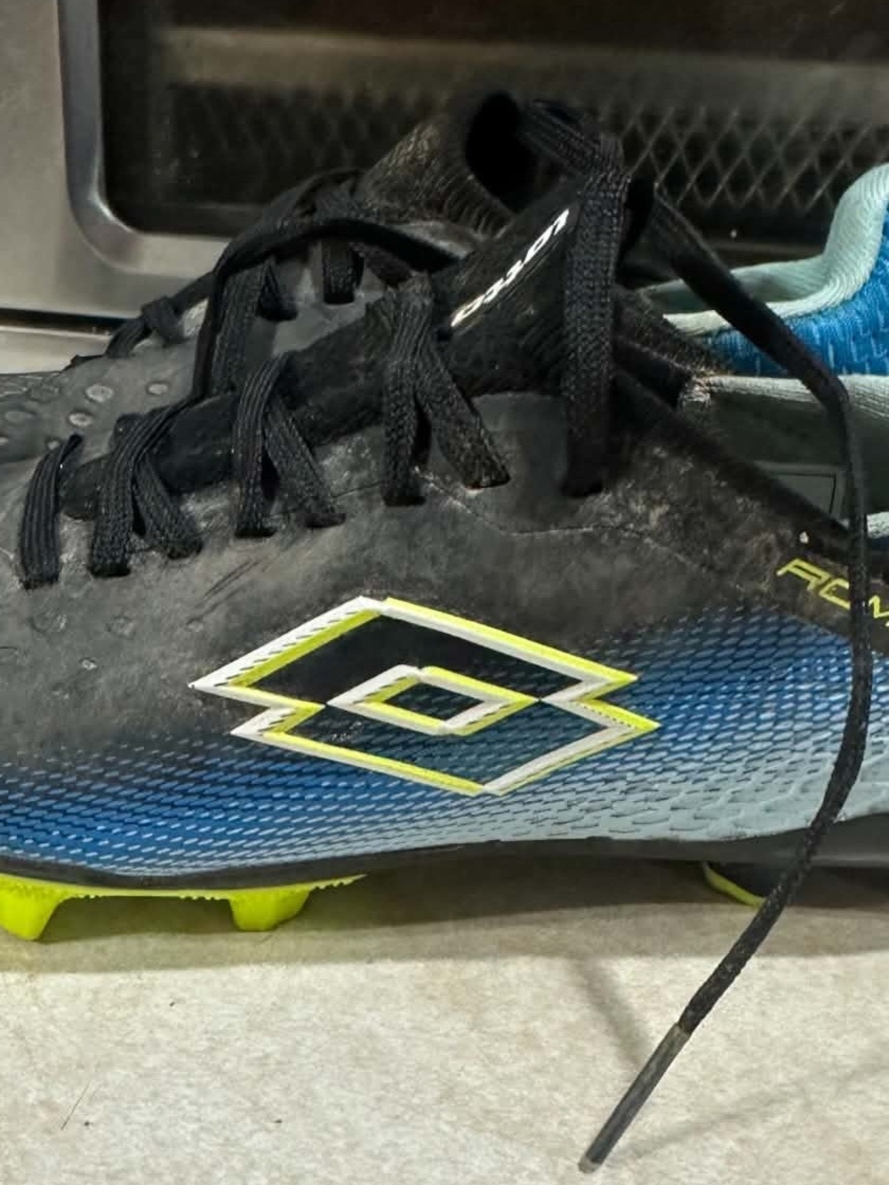 Lotto Kids' Soccer Cleats in Black & Blue with Neon Yellow Accents